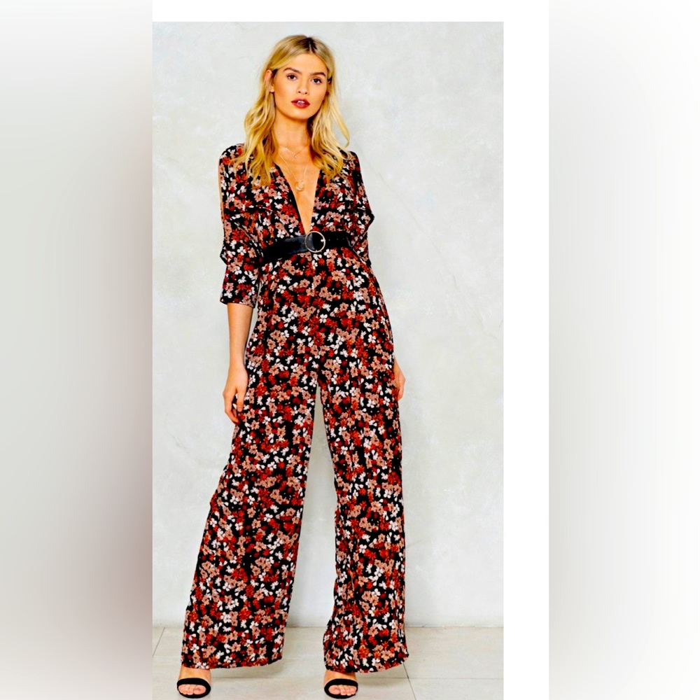 Nasty gal multi colored floral jumpsuit. Size 6
